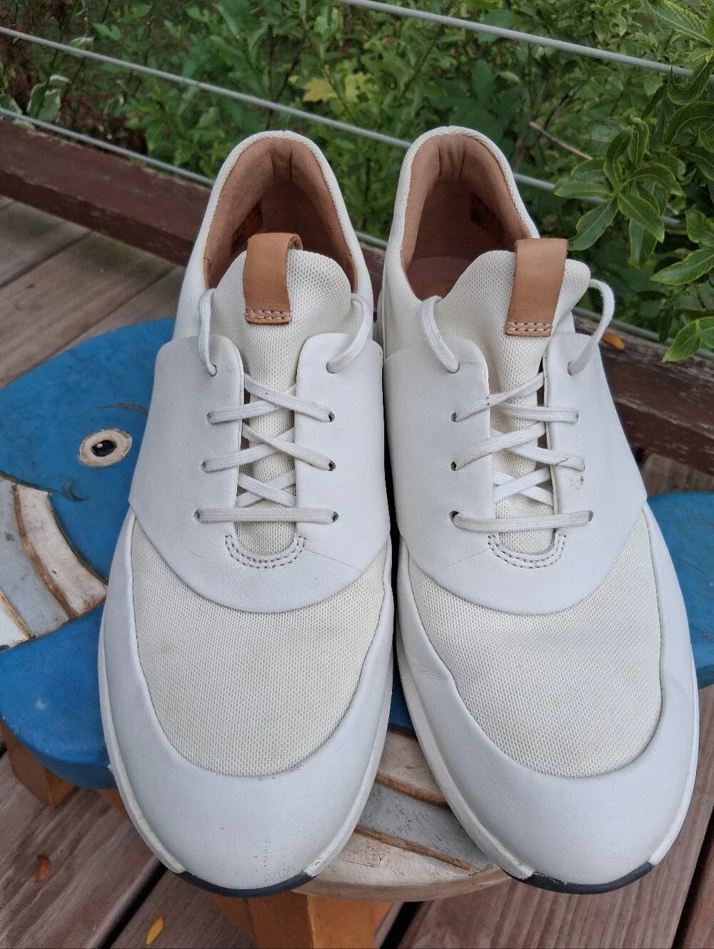 Womens White Casual Sneakers with Tan Accents. Body of Shoe Winter White.